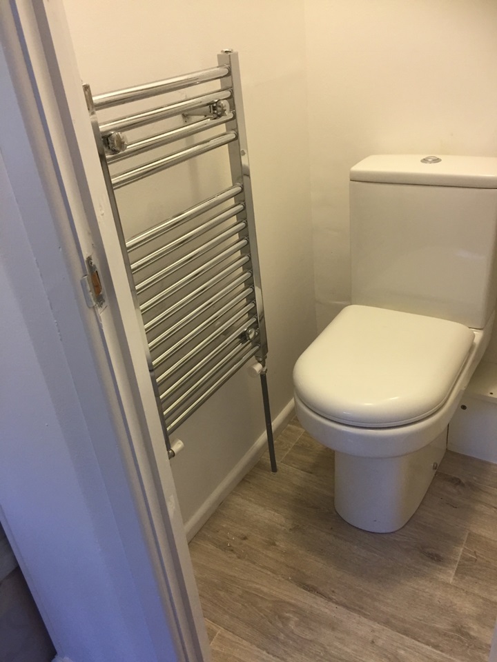 While the flat is small, it boasts its own toilet, shower and sink.