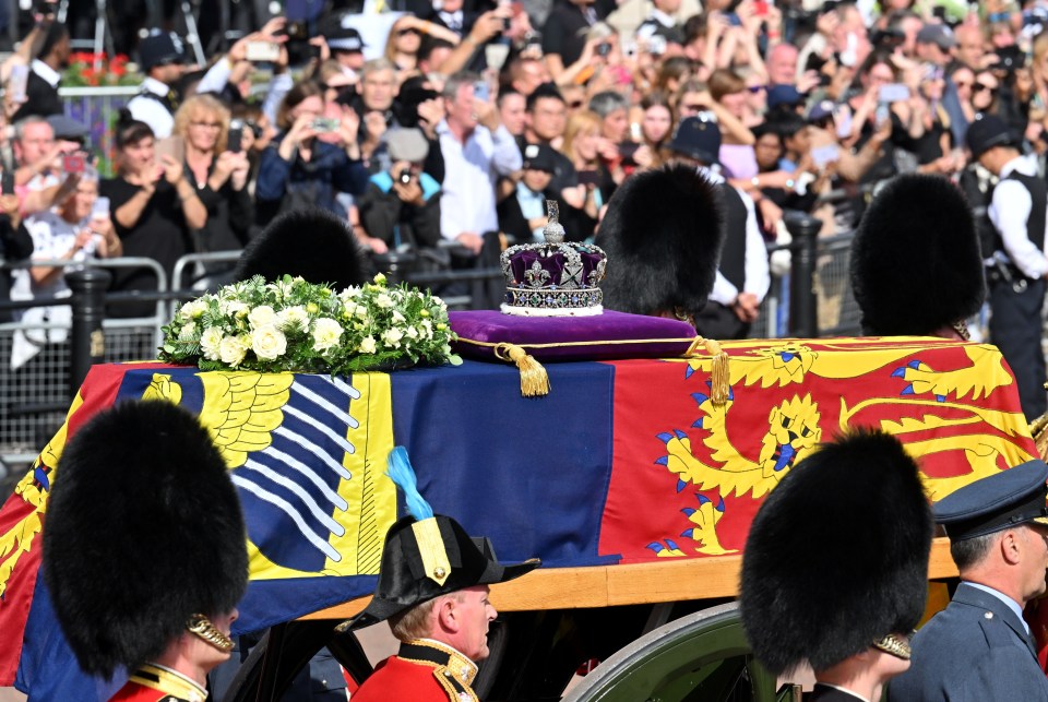 The Queen's coffin is en route to Westminster