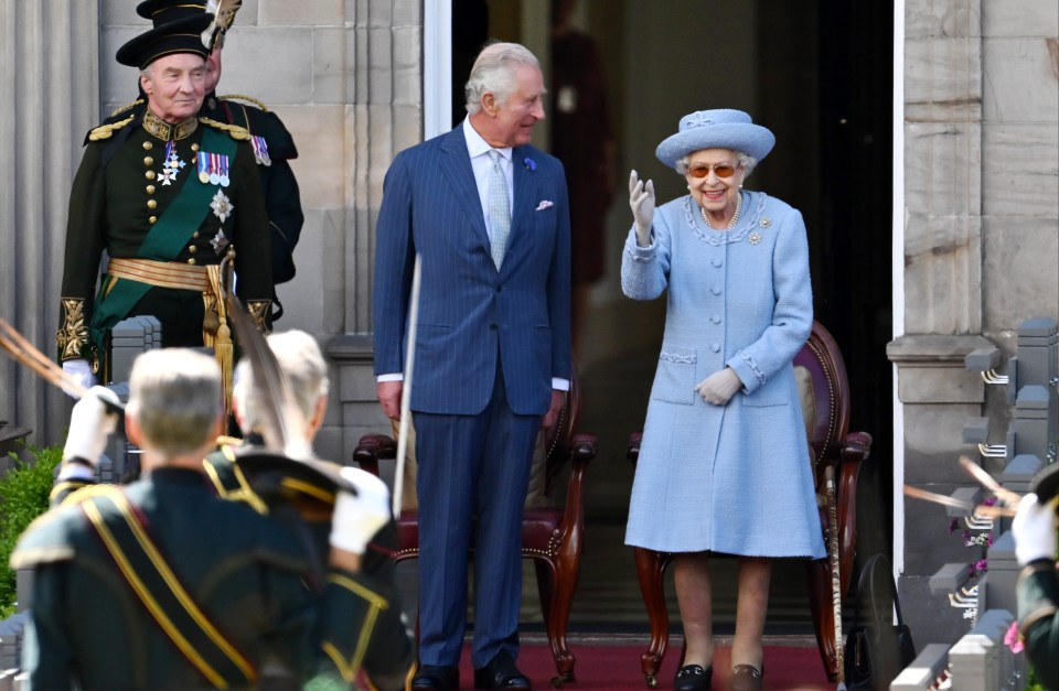 Prince Charles and the Queen at the Palace of Holyroodhouse in Edinburgh