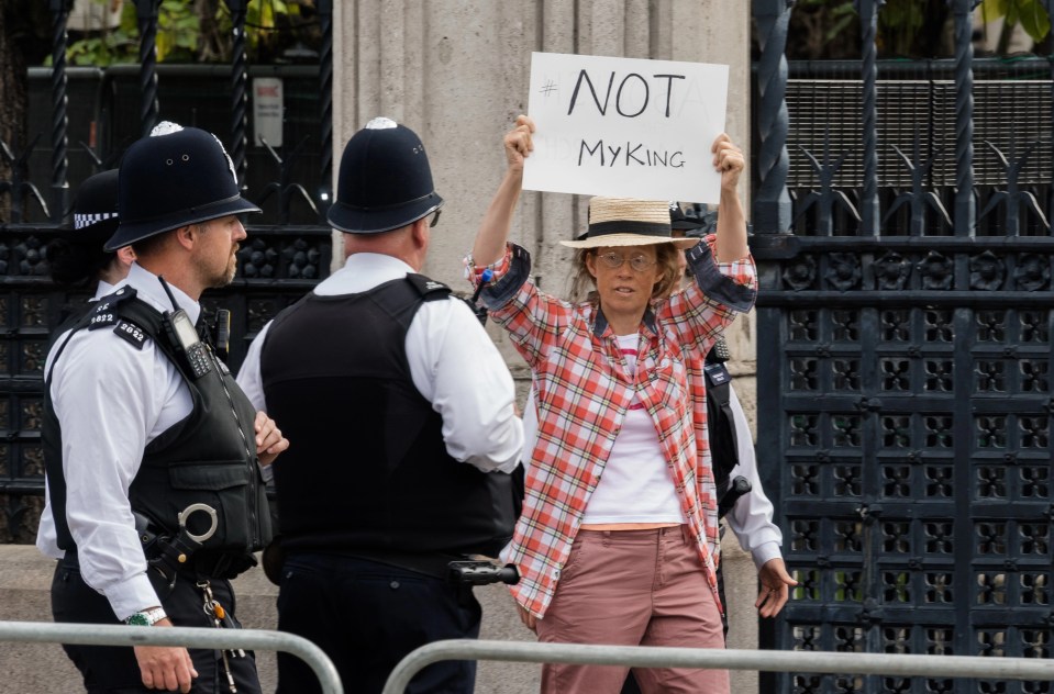 Anti-monarchy protester holds a sign outside Houses of Parliament as King Charles III receives address from both Houses of Parliament expressing their condolences