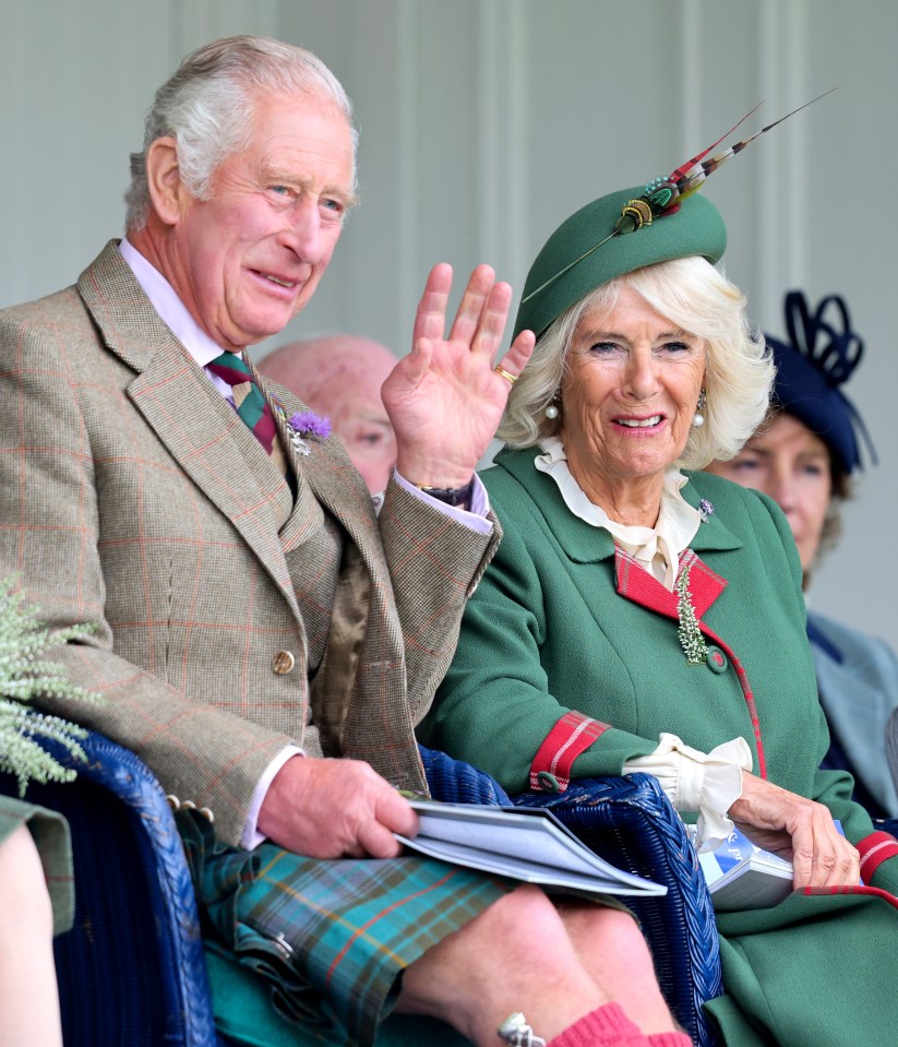 Prince Charles and Camilla beamed today as they enjoyed the Highland Games in Braemar, Scotland