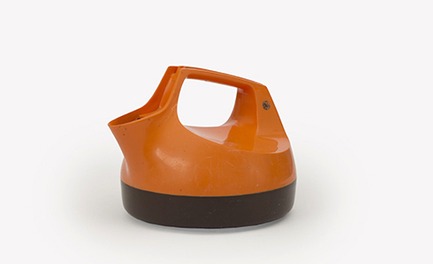 CURL UP WITH A CUPPA . . . it looks like a cross between an air-hockey paddle and a curling stone but the KE12 General Electric kettle won design awards in 1978