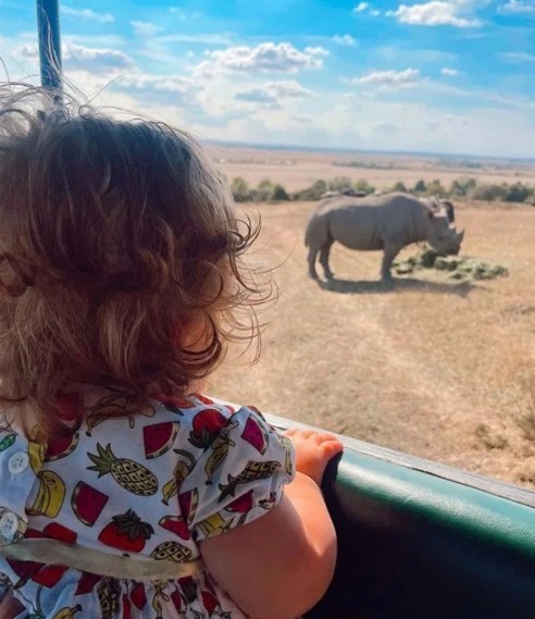 Carrie also posted this pic of daughter Romy looking at a rhino at the safari park