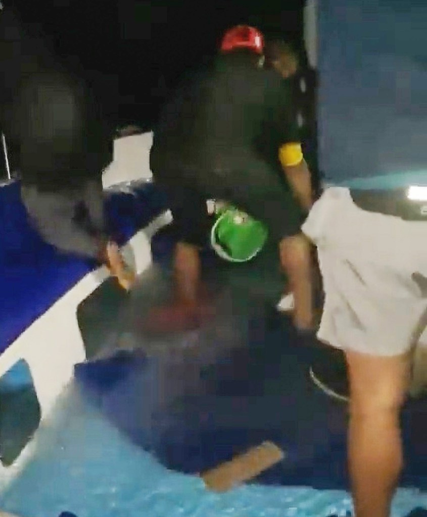 Footage emerged of crewmembers desperately trying to dish water out of the boat