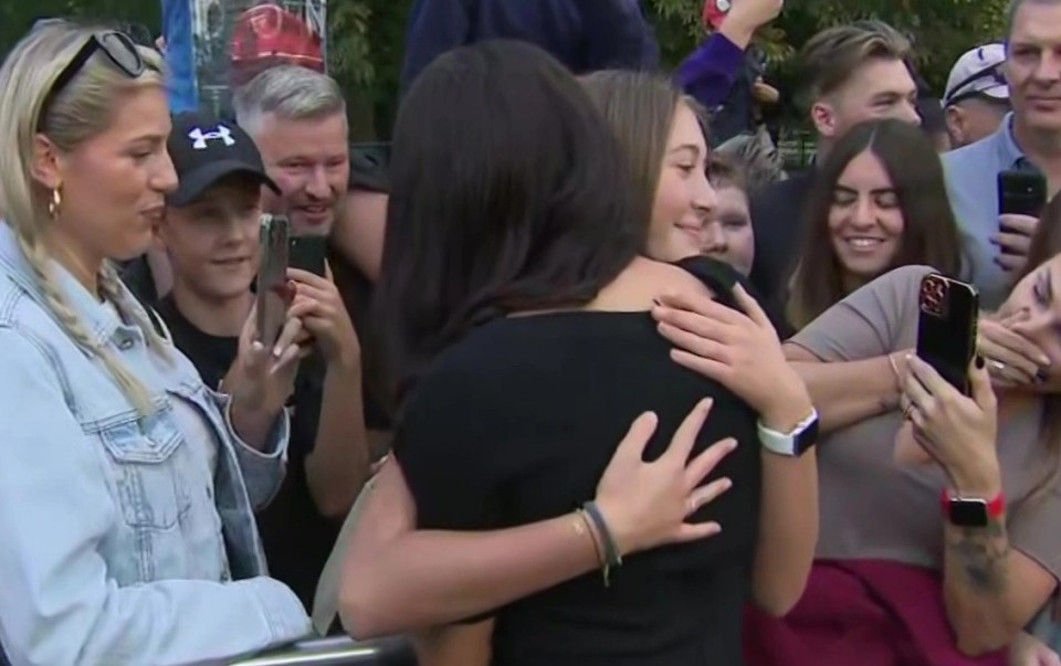 Meghan was hugged by one mourner