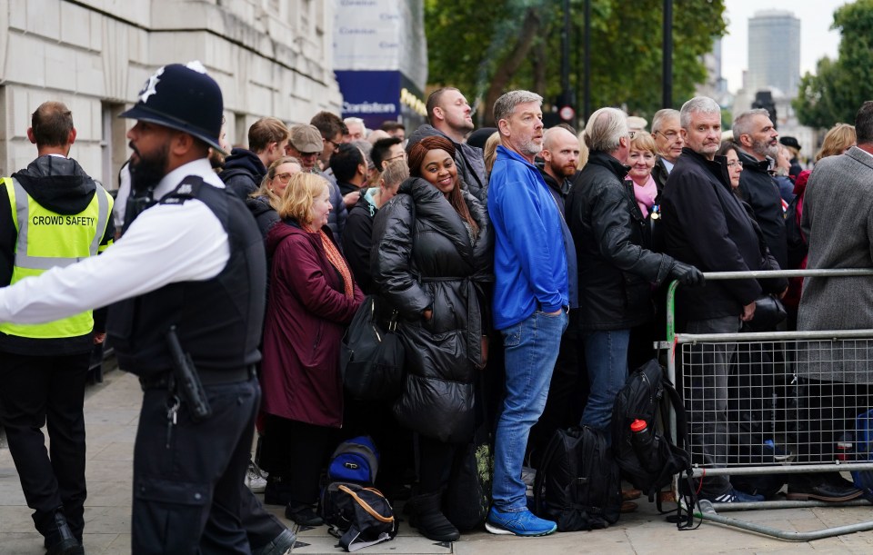 Police were seen keeping order for those in the massive queues