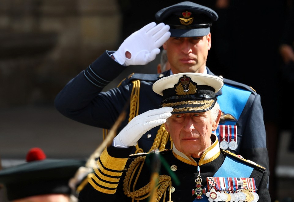 King Charles and son William salute the Cenotaph - but Princes Harry and Andrew were unable to