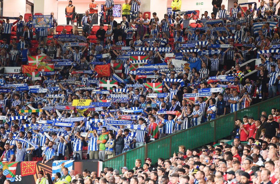 Sociedad supporters held their flags aloft in tribute