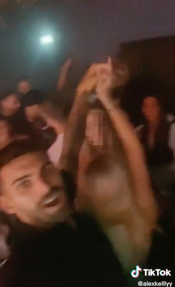 Adam Collard dances with the beautiful blonde in a nightclub