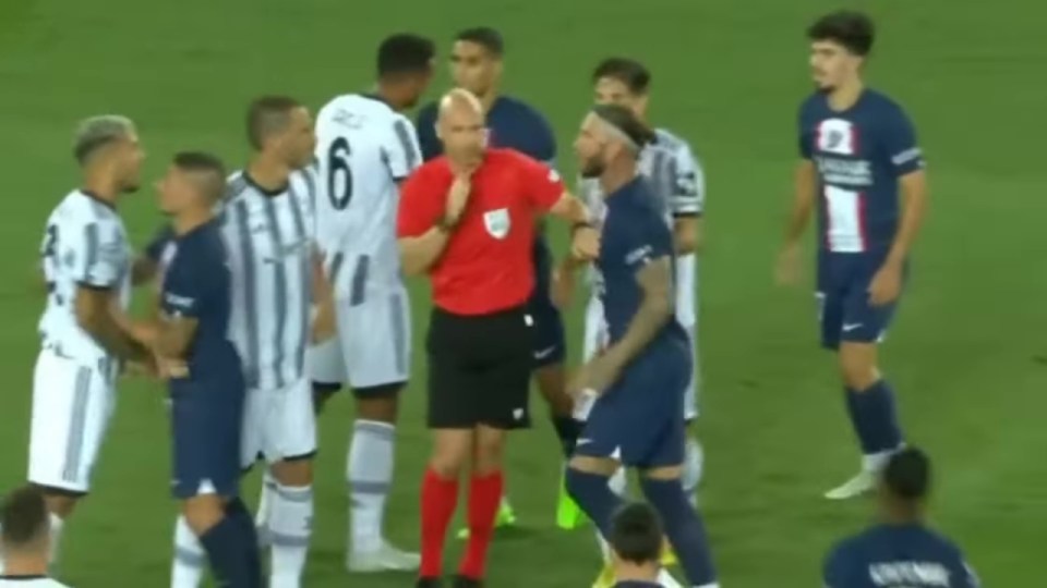 English ref Anthony Taylor desperately tries to restore order as fights break out around him