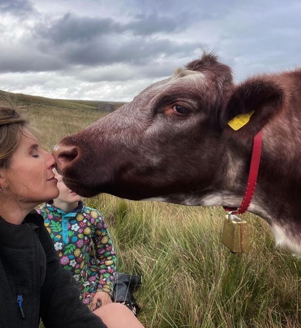 Amanda Owen has shared some sweet snaps with daughter Clemmie and their pet cow