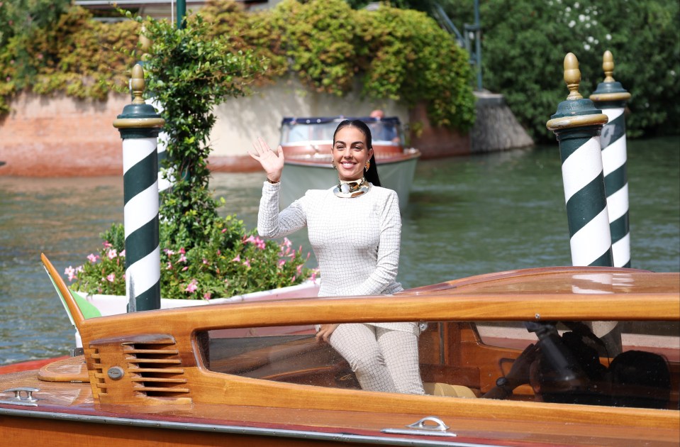 Georgina waved to fans after arriving at the festival