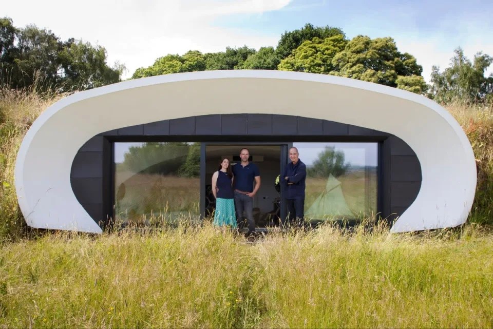 Self-builders Dorran and Vereuschka with presenter Kevin McCloud