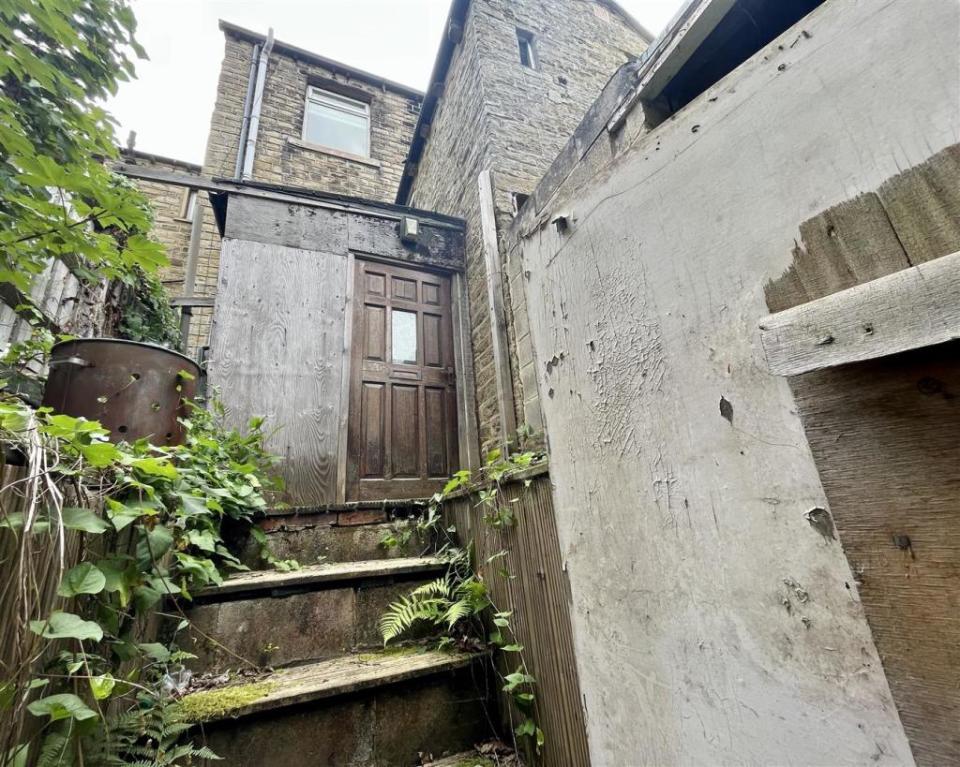 The two-bed flat in Huddersfield is in need of a complete renovation