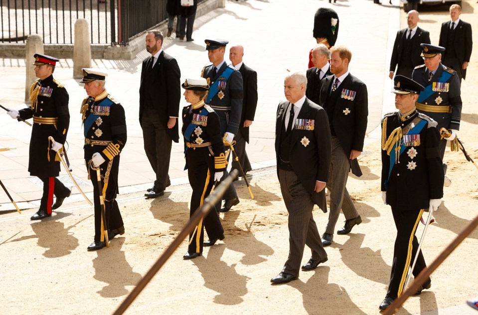 The royals moments before saluting the coffin outside the abbey