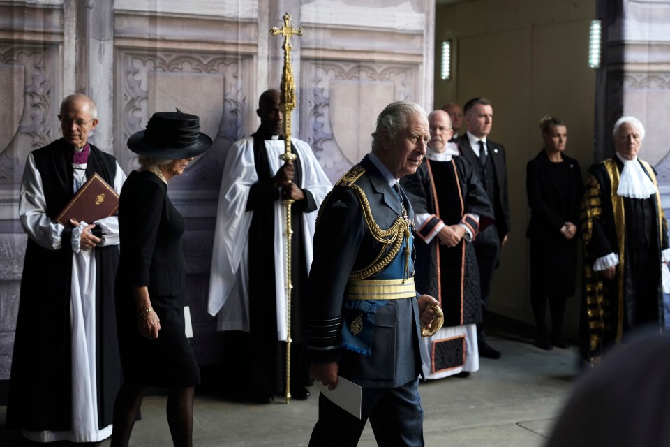 The King and Queen Consort leave after paying their respects to the Queen