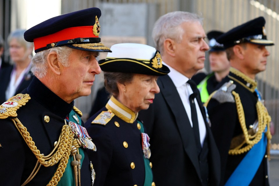 Charles, Anne, Andrew and Edward follow their mother’s coffin up the Royal Mile