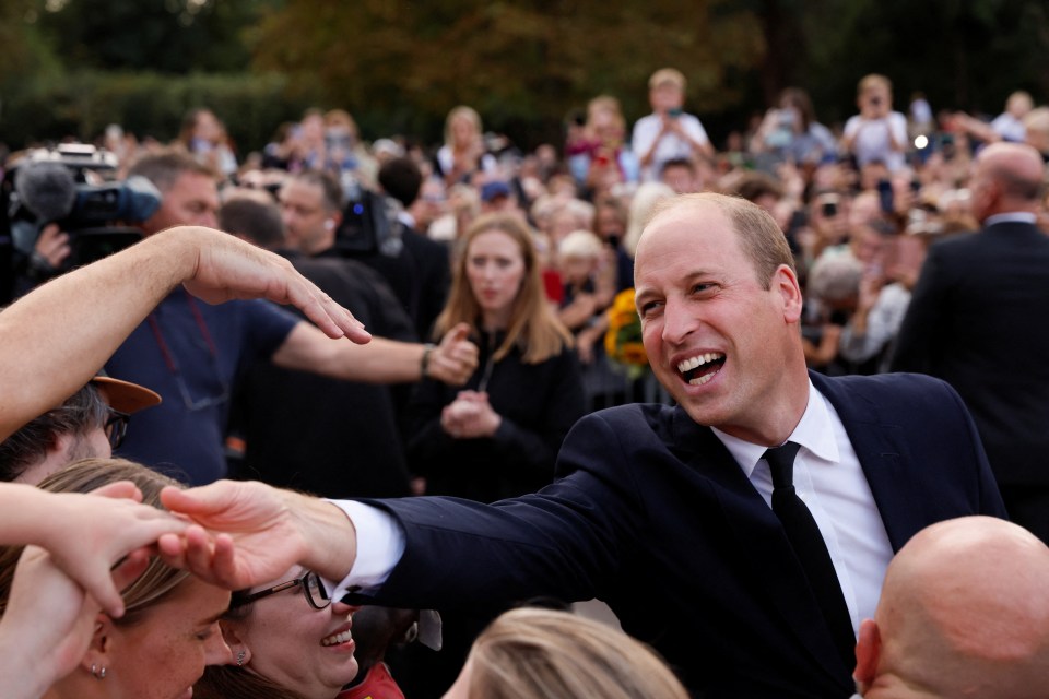 William was pictured speaking to fans