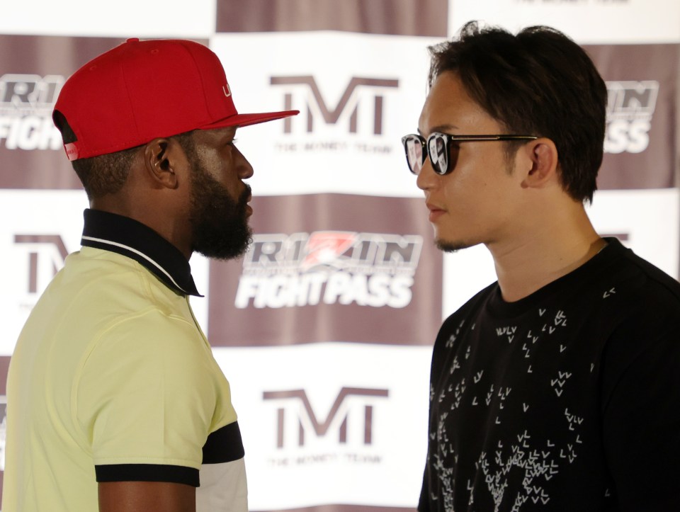 Floyd Mayweather with his next opponent Mikuru Asakura