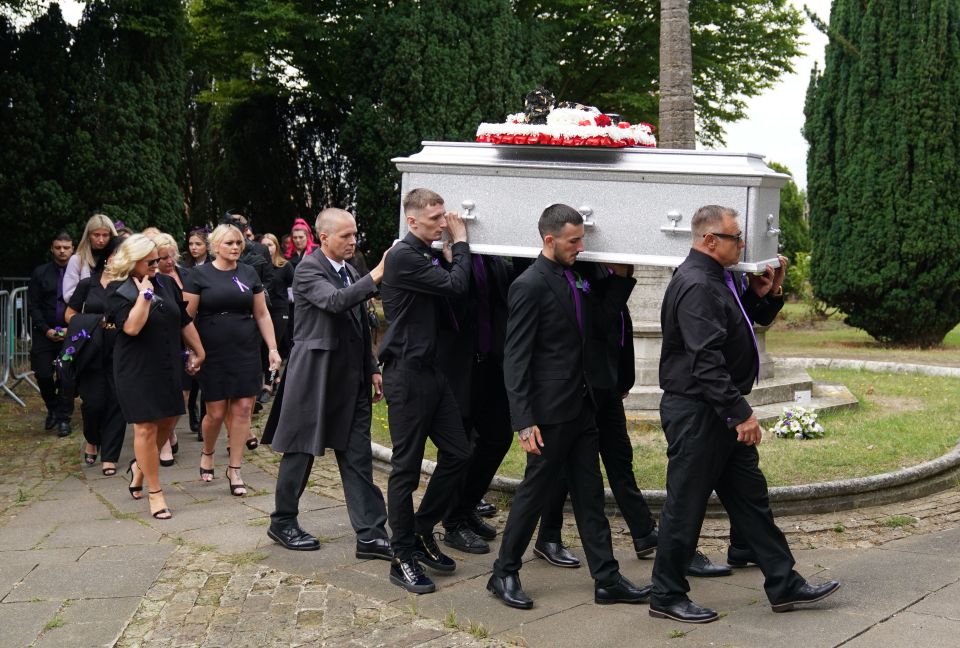 Pallbearers carry the silver coffin of little Archie into St Mary's Church in Prittlewell, Southend