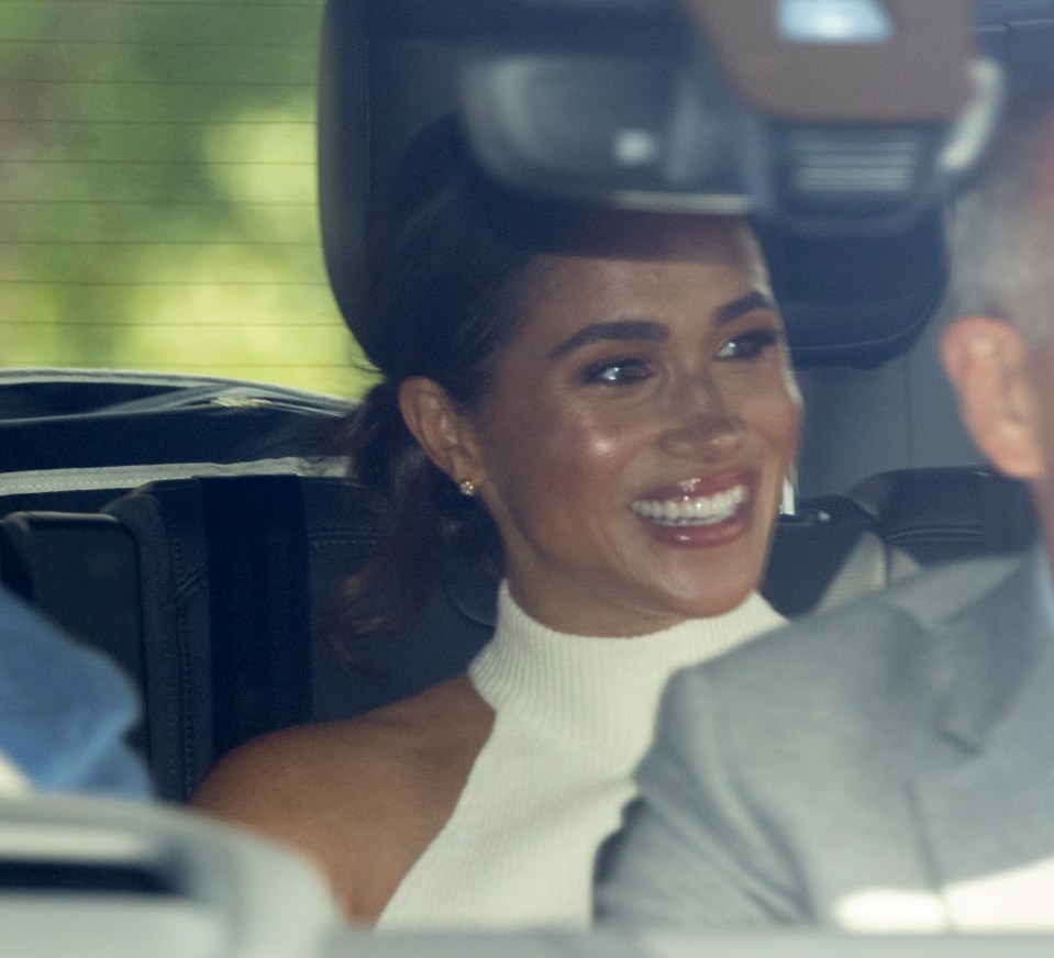 Meghan smiled as she left Windsor for their Invictus Games job in Dusseldorf Germany this morning