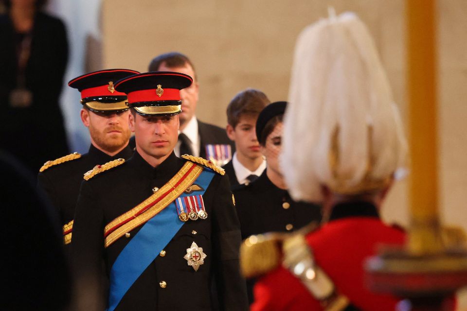 Princes William and Harry stand together to show a united front for a historic vigil at the Queen’s coffin