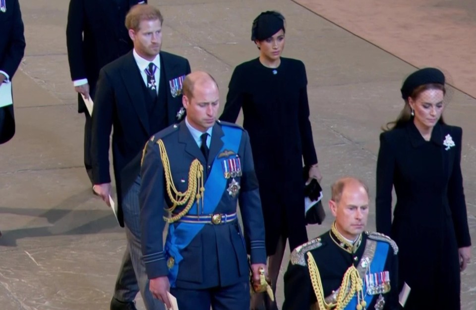 Harry and Meghan appeared to hold hands as they left the service