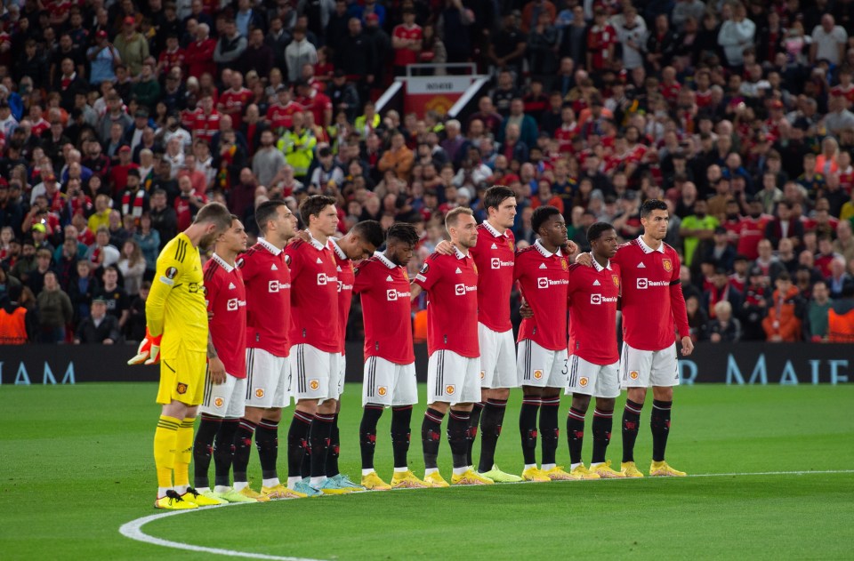 Both sets of players gathered in the middle of the pitch as players wore black armbands