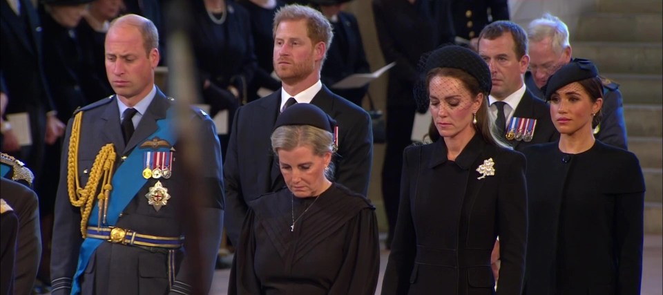 The Princess and Prince of Wales are standing in front of the Duke and Duchess of Sussex