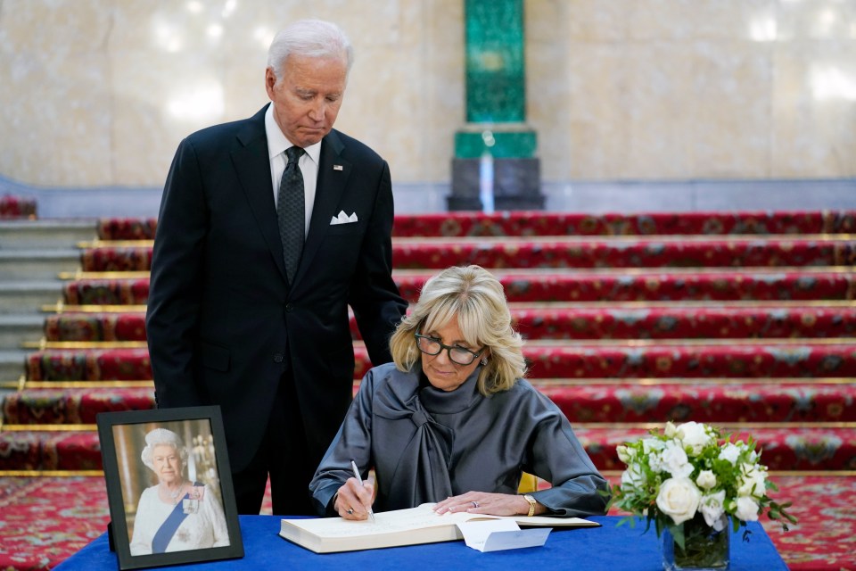 First lady Jill Biden signs a book of condolence at Lancaster House