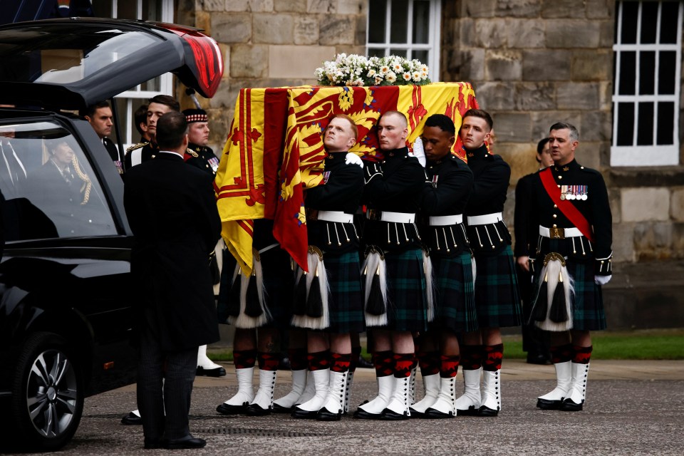 The Queen's coffin is carried in Holyrood