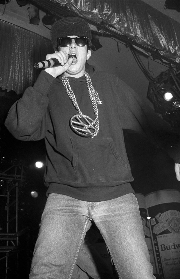 Rapper Mike D of the Beastie Boys wearing a VW sign