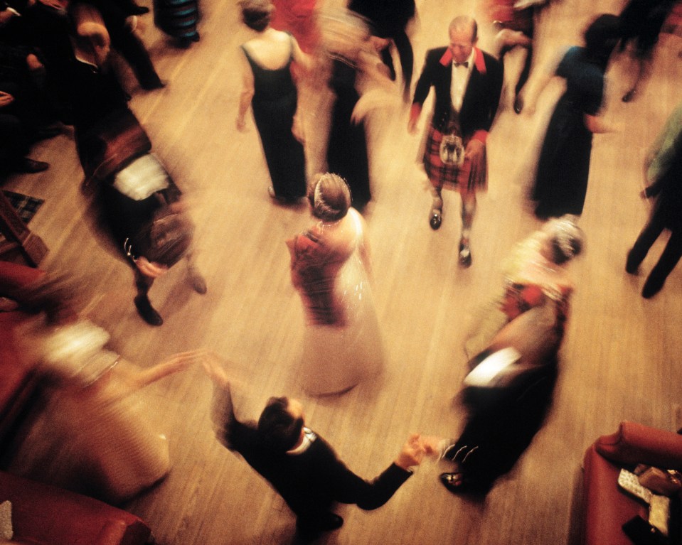 The Queen dancing with Philip and the Queen Mum, right, at Ghillies Ball, 1971