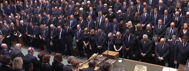 MPs stand for a minute's silence in honour of the Queen