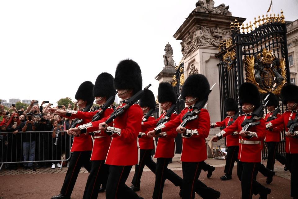 Guards leave Buckingham Palace for the ceremony