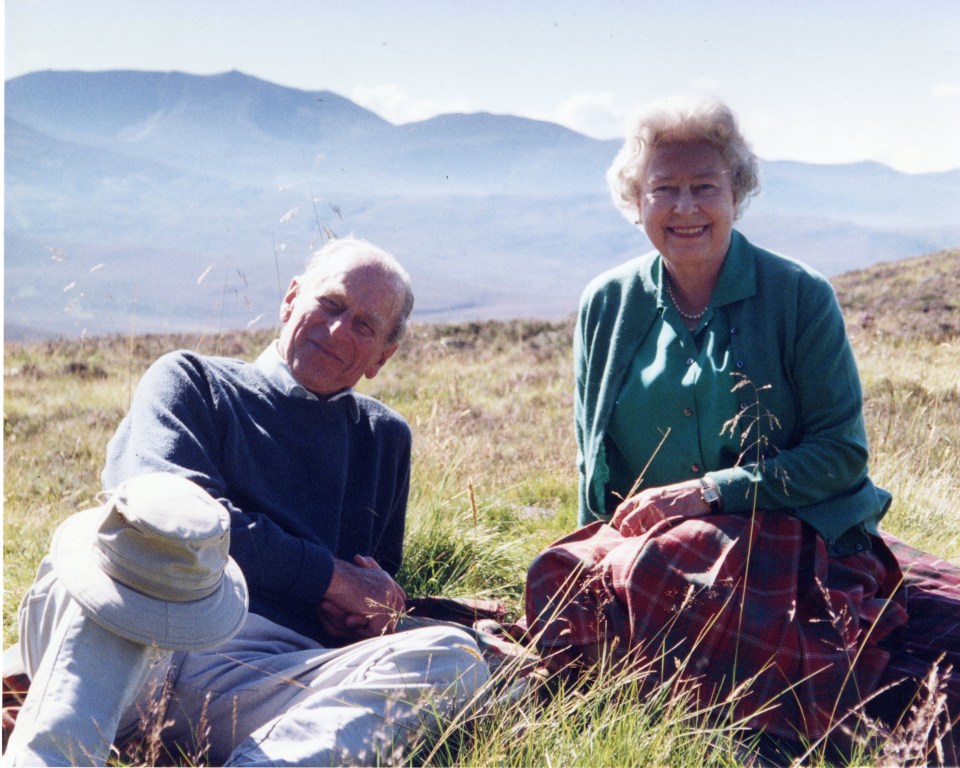 The Queen and Prince Philip in their happy place, relaxing at Balmoral in 2003