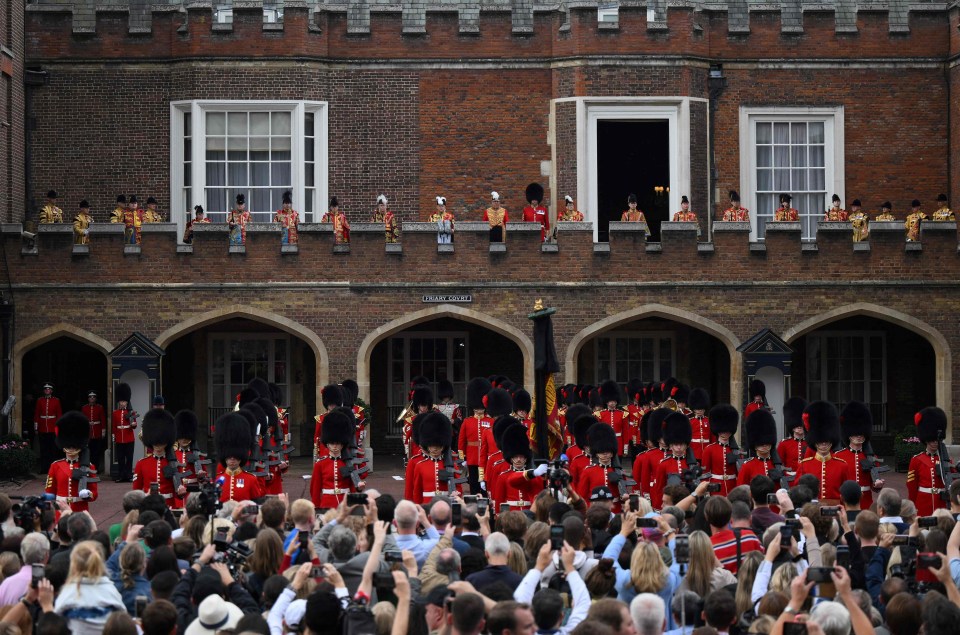 Crowds watch the proclamation at St James’ Palace