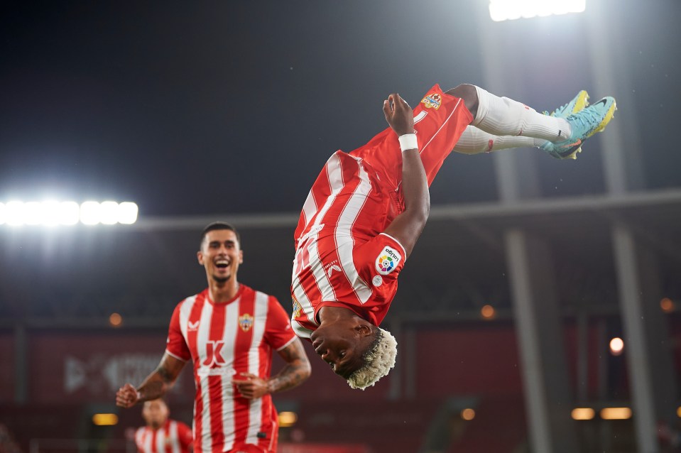 Ramazani celebrates his goal with a trademark somersault