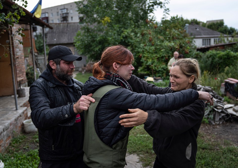 A mother and daughter reunited in the recaptured city of Izyum