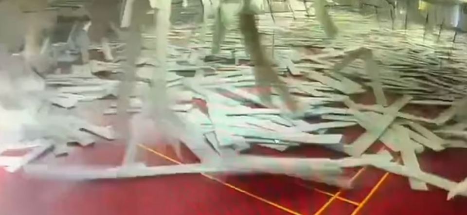 Shocking footage showed the ceiling collapsing, sending players fleeing for their lives