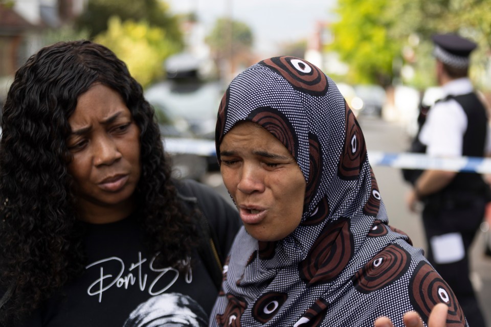 Kim Alleyne, mum of the pregnant fiancee of Chris Kaba, speaks at the scene