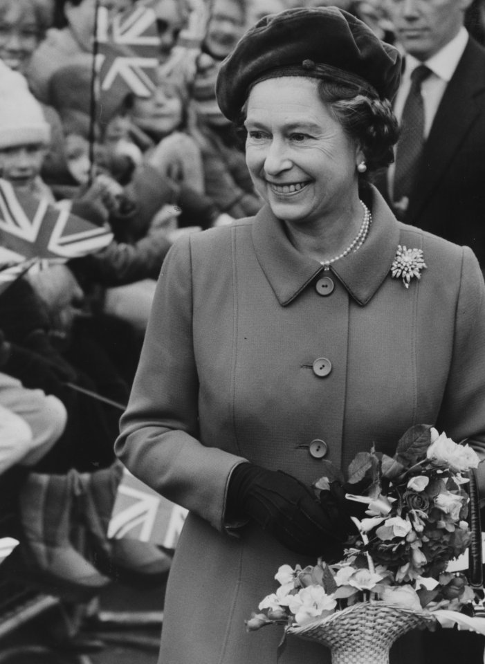 Queen Elizabeth II was pictured during a visit to the Passmore Edwards museum in East Ham, East London in 1983