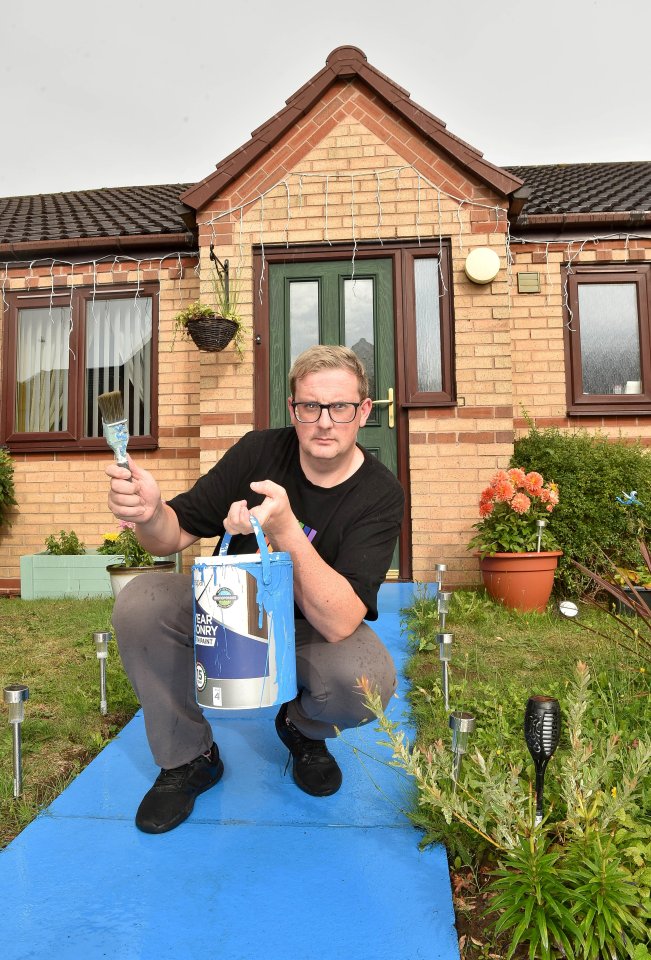 Paul Ryder and his partner painted their path blue but were soon told by the landlord to re-paint