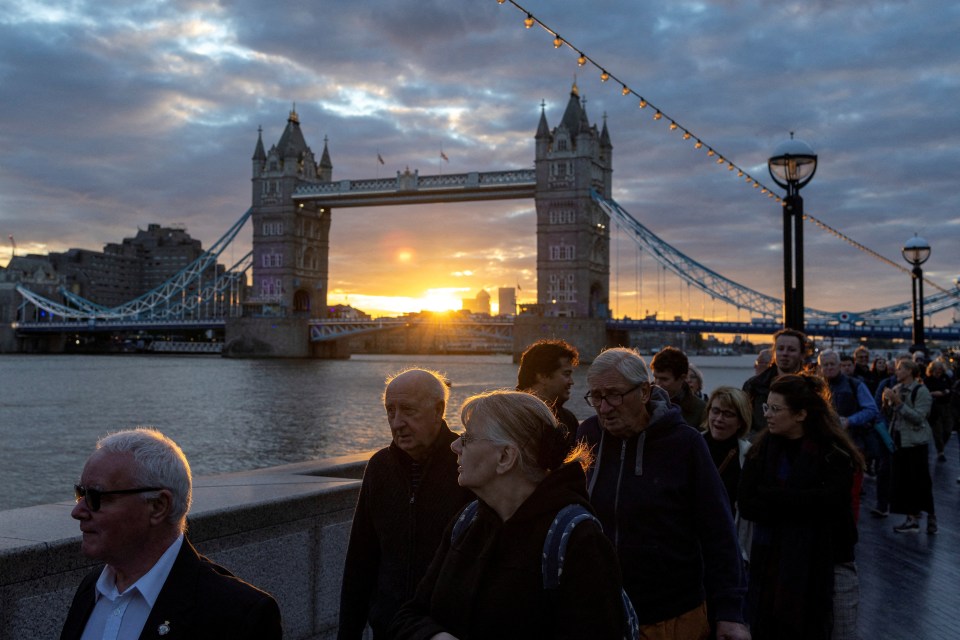 Queues to visit the Queen lying in state stretch for miles along the Thames