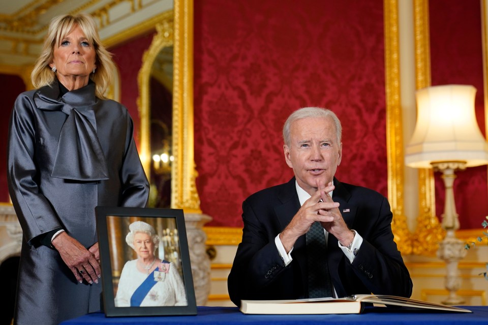 Biden speaks while signing a book of condolence at Lancaster House