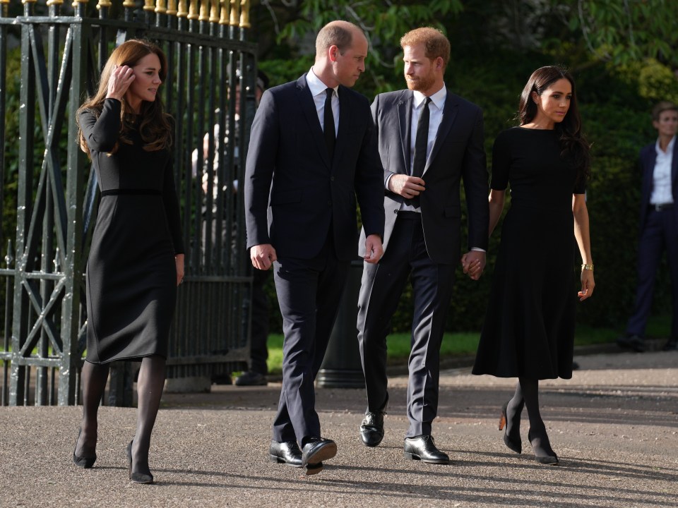 Harry and Kate appear to chat as they walk through Windsor