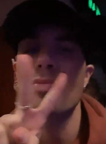 Max put a peace sign up at the camera before showing the stage