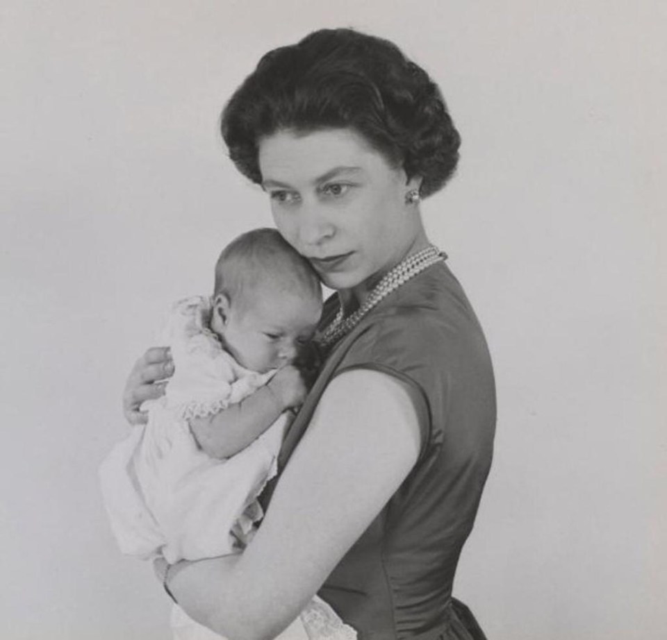 A photo of the Queen with Andrew as a baby, issued alongside his statement