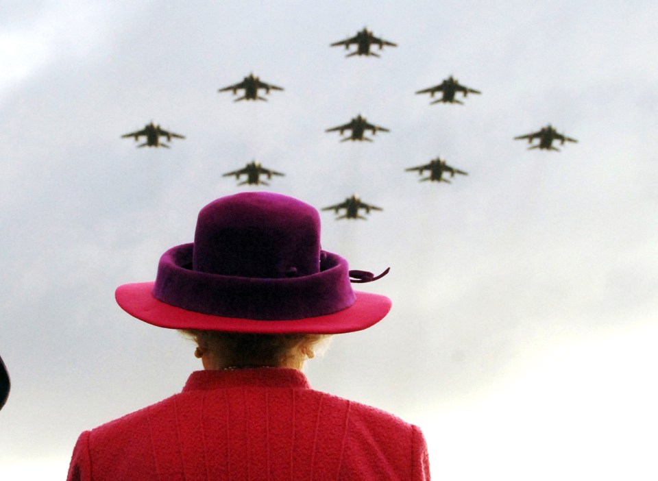 The Queen watches RAF Jaguars flypast in a ‘Diamond 9’ formation at Coltishall in Norfolk, 2005