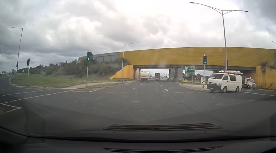 Car's dashcam shows a green light but a van coming the opposite way turns right